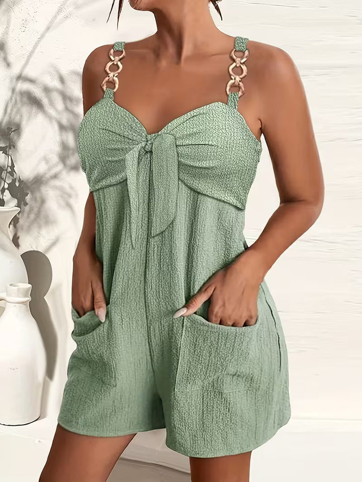 Loaiza – Ärmelloser Jumpsuit mit Kettenriemen