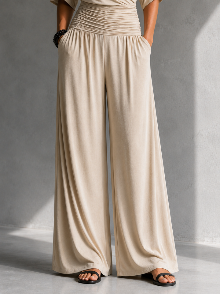 Greene – Jumpsuit mit Wickelausschnitt, Cold-Shoulder-Details und weitem Bein
