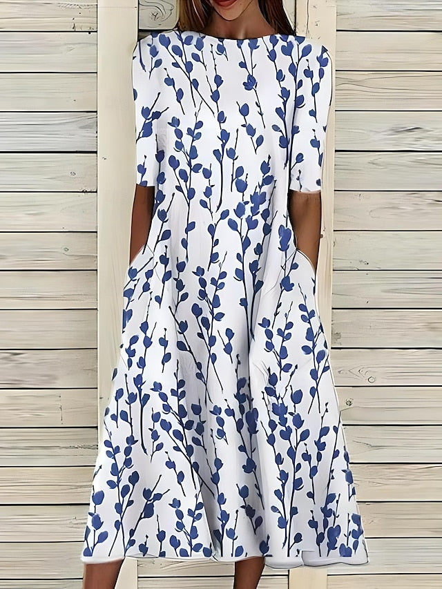 Kwanza – Fließendes Midikleid mit Blumenmuster