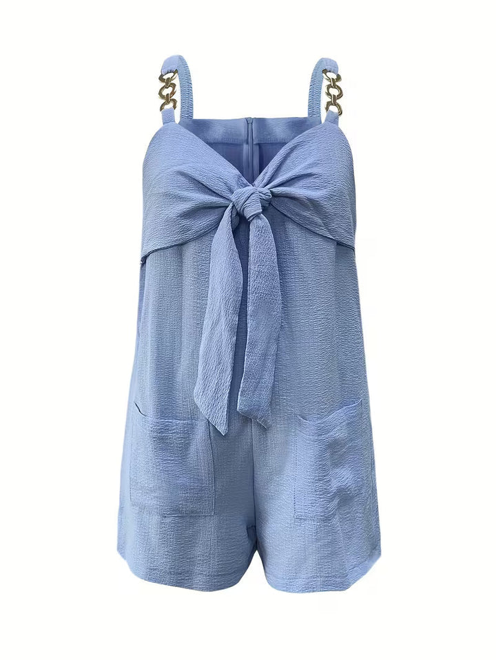 Loaiza – Ärmelloser Jumpsuit mit Kettenriemen