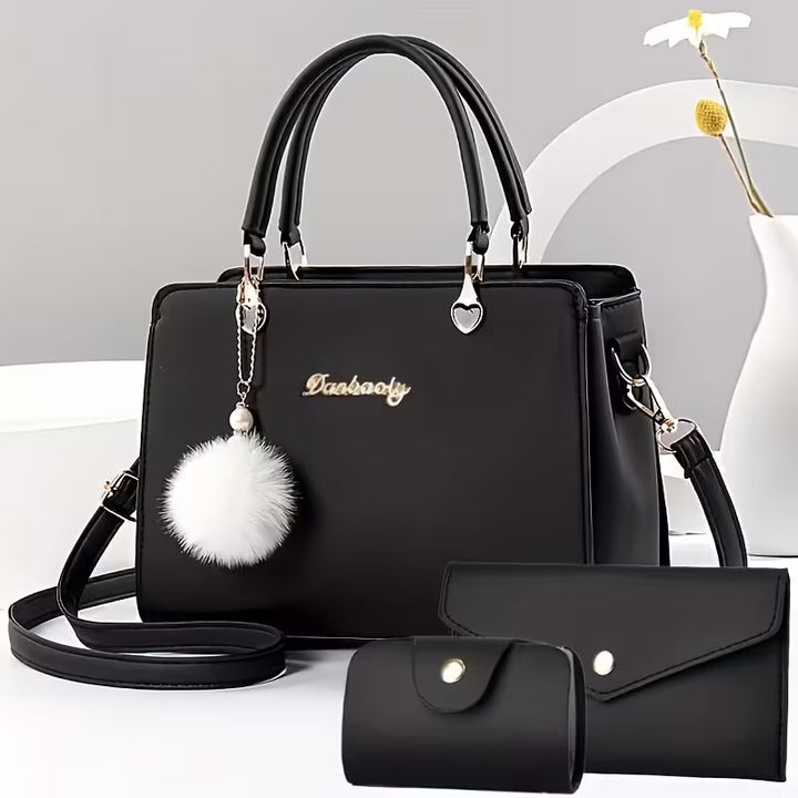 Sanika – Handtasche Mit Pompon Anhänger Und Schulterriemen