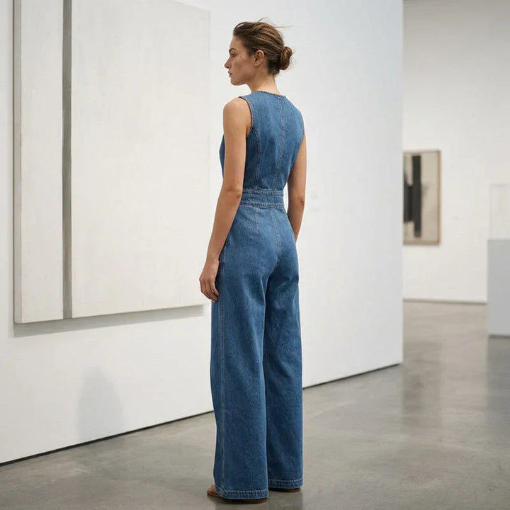 Laurien – Ärmelloser, asymmetrischer Denim-Wickel-Jumpsuit